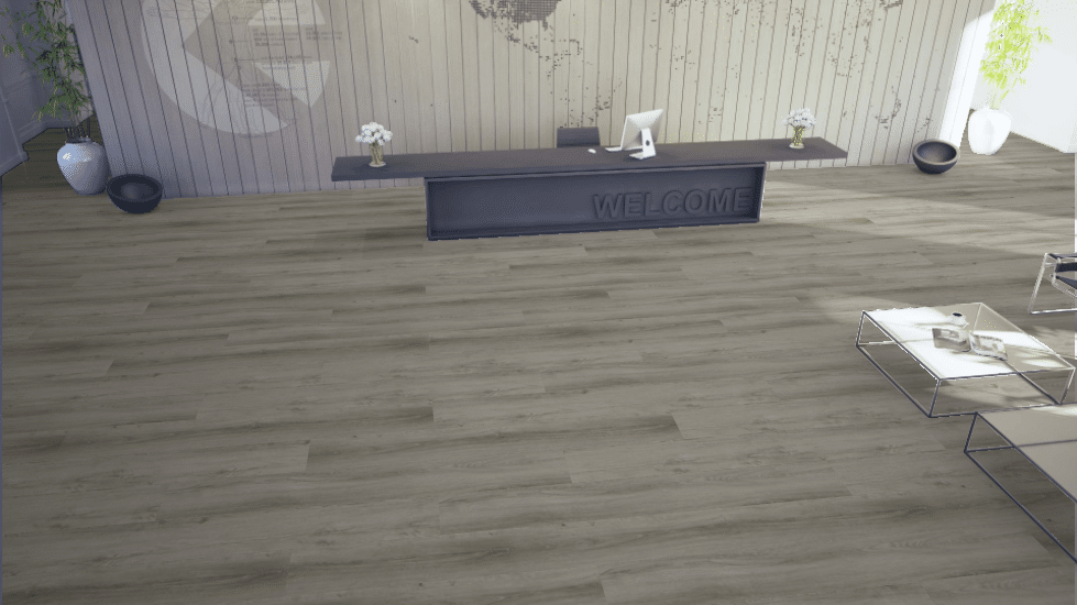 A modern reception area with wood-look flooring, a dark welcome desk, and light-toned, textured wall paneling.