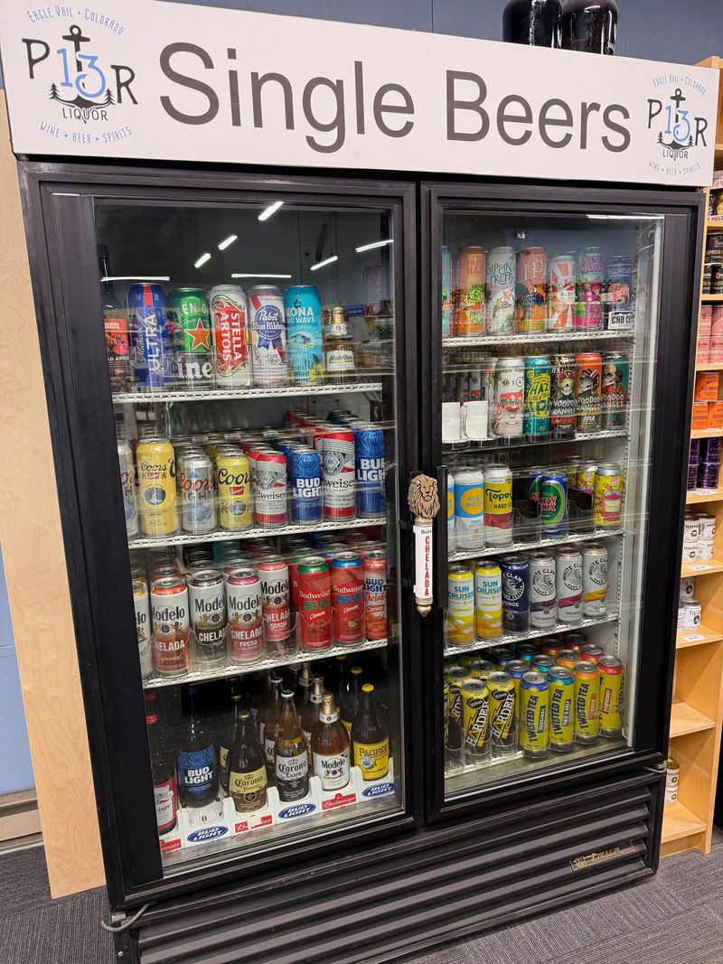 Pier 13 single beers cooler stocked with cans, seltzers and bottles