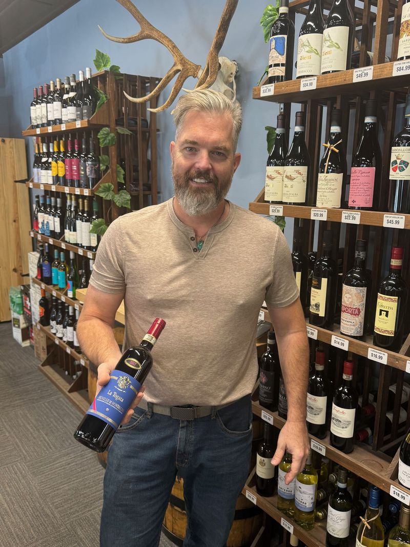 The Pier 13 Liquor team at the shop in Avon