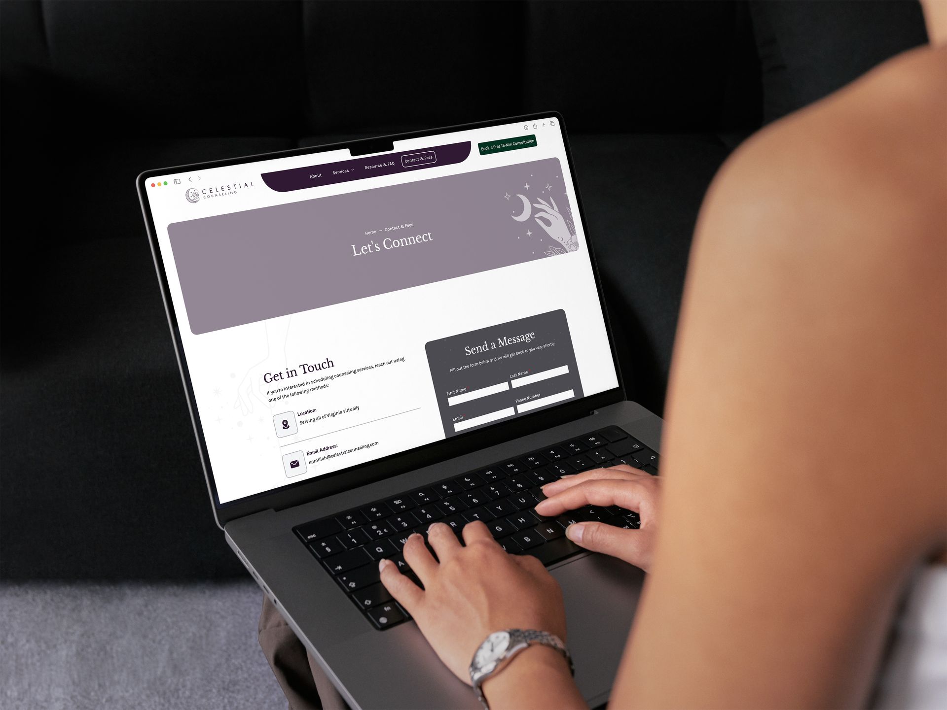 Laptop on a wooden table displaying a webpage with pastries.