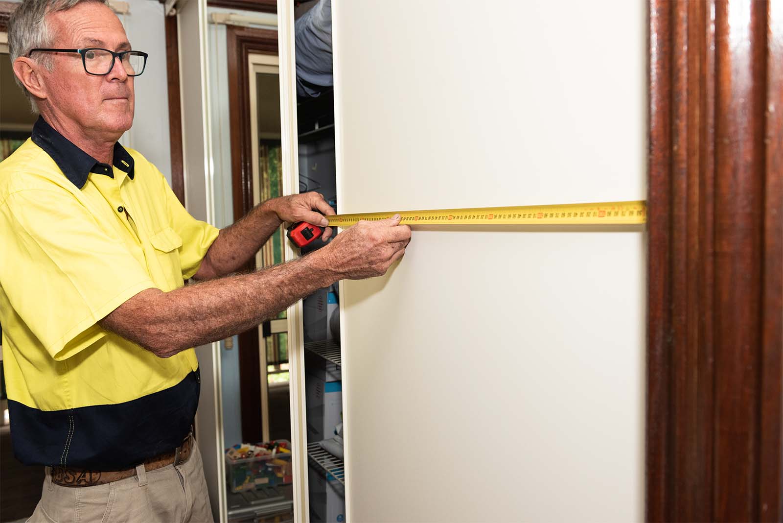 Sunshine Coast Carpenter Preparing To Install Shelving