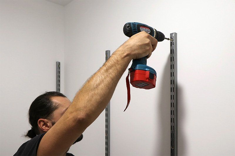 Sunshine Coast Handyman Installing Racking And Shelving