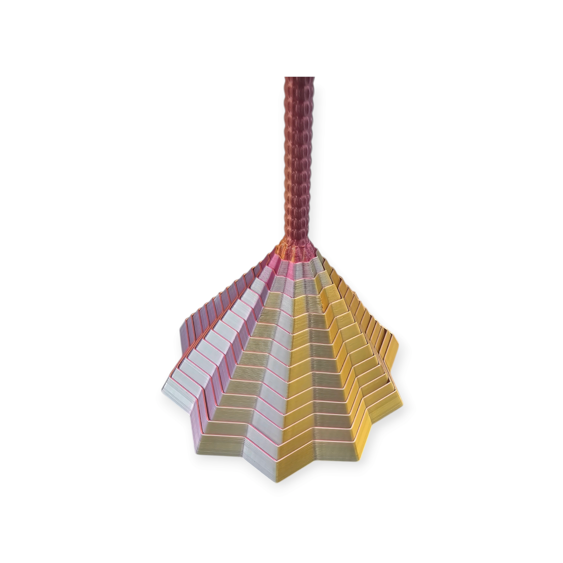 Een 3D-geprinte stervormige tol met een kleurverloop van warmgeel naar dieprood.