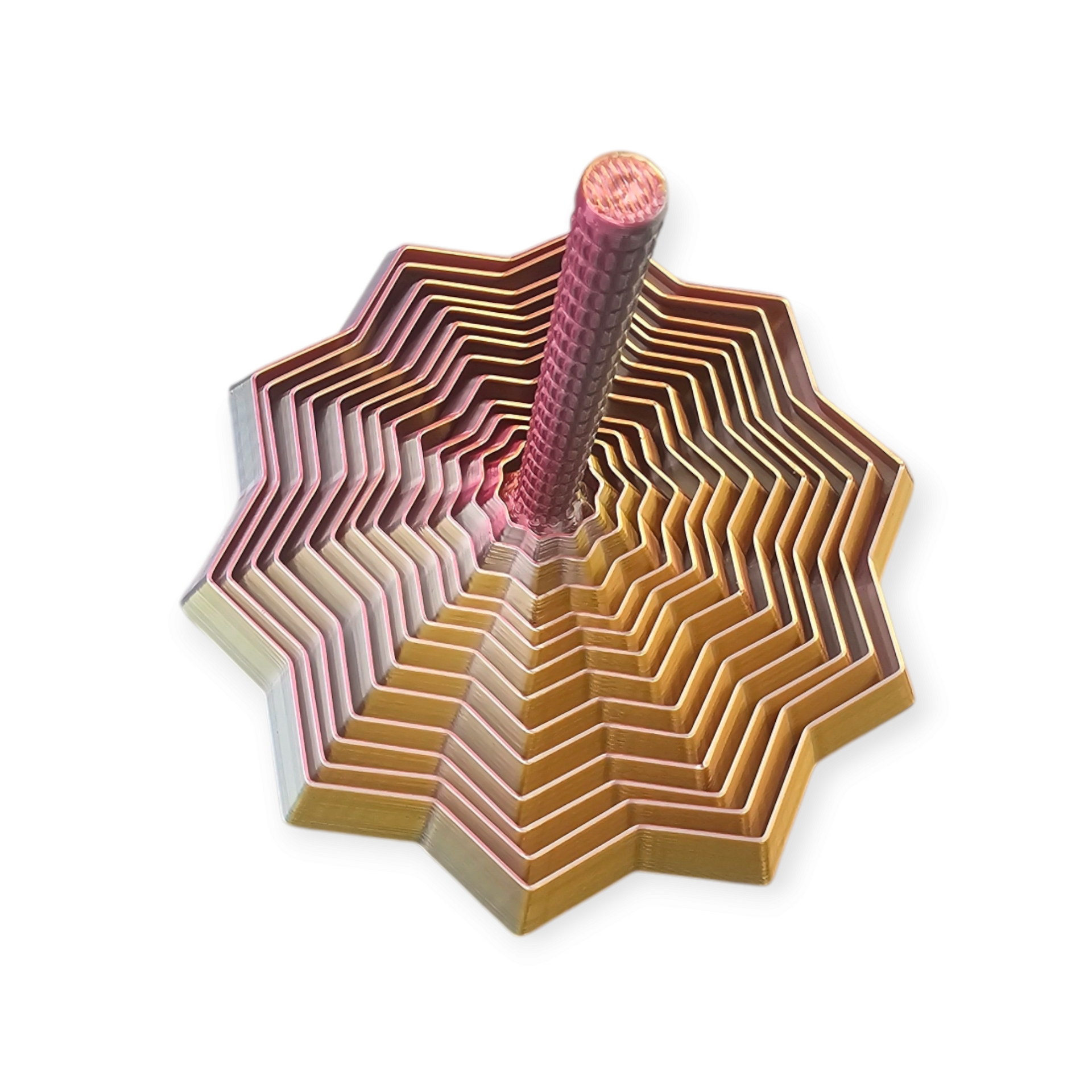 Een 3D-geprinte stervormige tol met een kleurverloop van warmgeel naar dieprood.