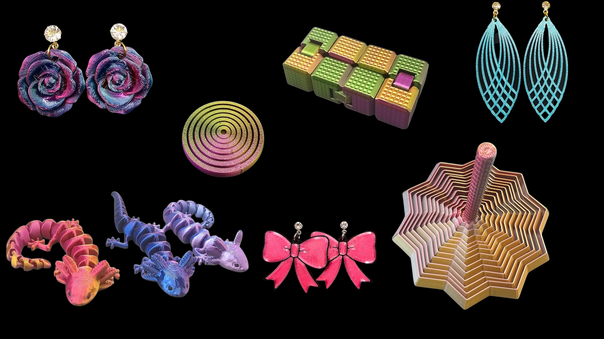 Sieraden en fidget toys: oorbellen, hagedissen, strikjes en een veelkleurige tol, op een zwarte achtergrond.