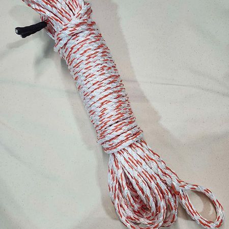 A coiled length of white rope with orange flecks, featuring a black plastic tip and a looped end.