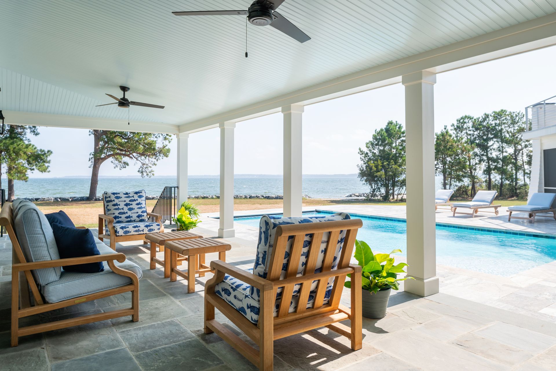 image of a patio with a pool in the background