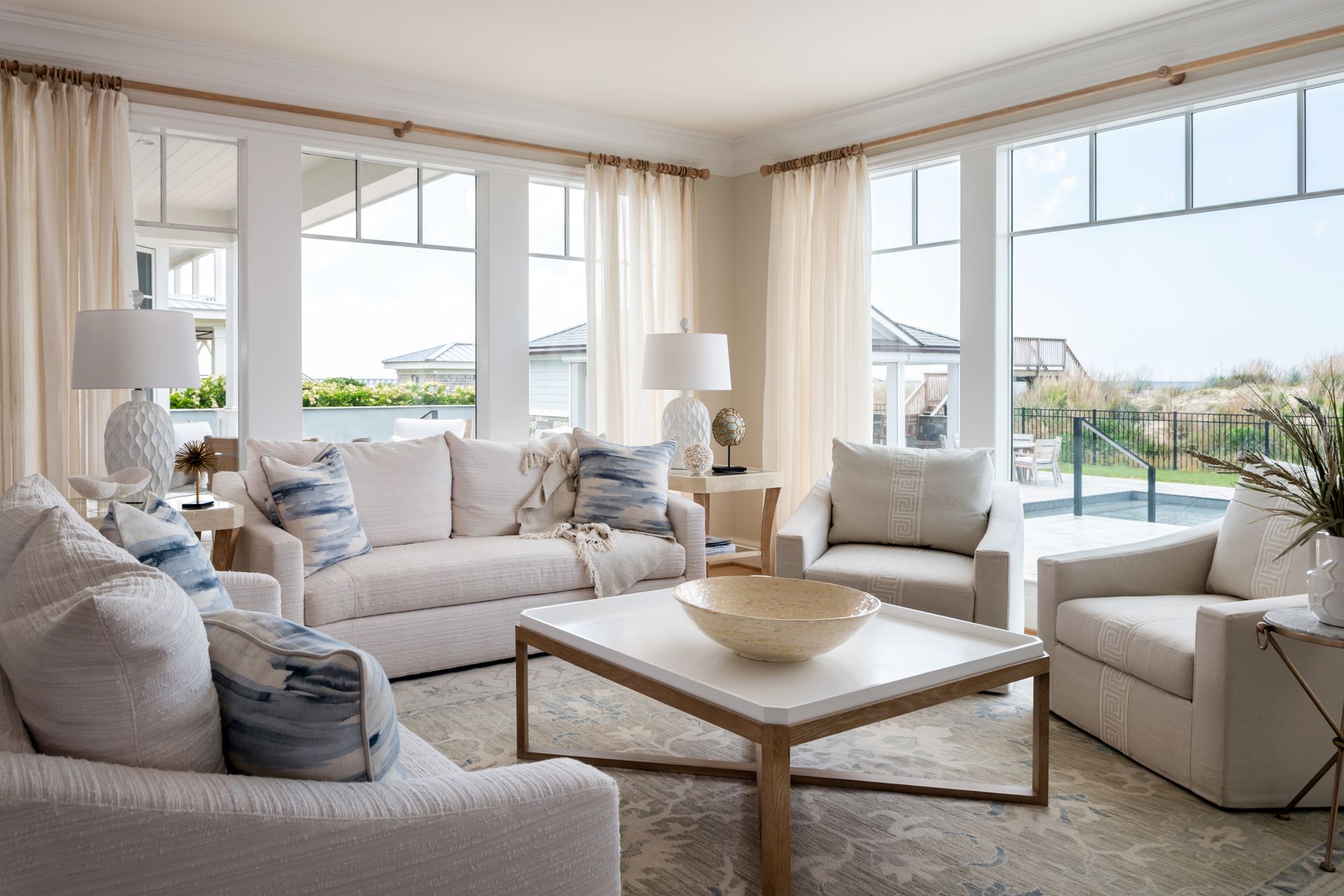 a living room with a couch and two chairs