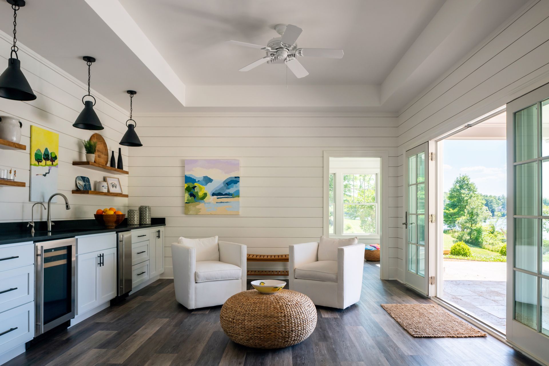 pool house kitchenette with chairs 