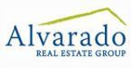 A logo for a real estate group called alvaro real estate group.