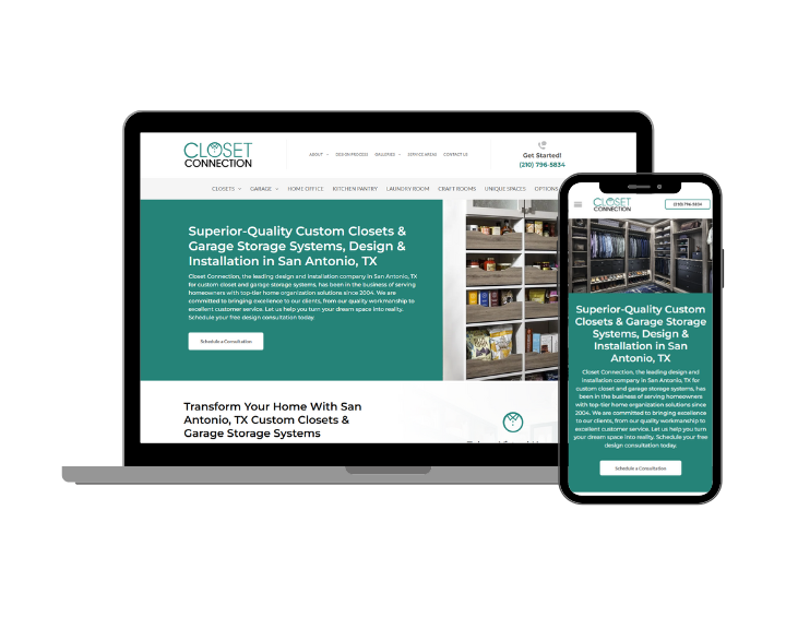 A laptop and a cell phone are sitting next to each other on a white background.