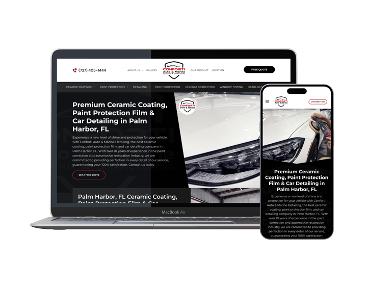 A laptop and a cell phone are sitting next to each other on a white background.