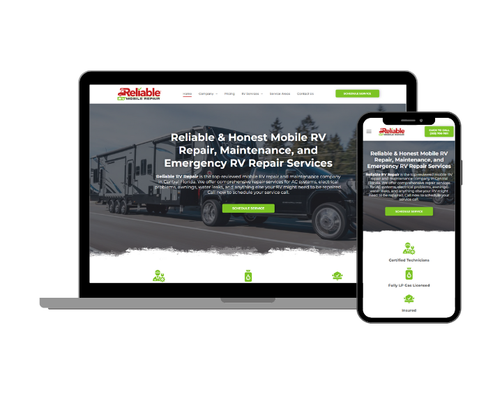 A laptop and a cell phone are sitting next to each other on a white background.