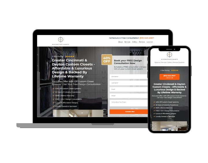 A laptop and a cell phone are sitting next to each other on a white background.