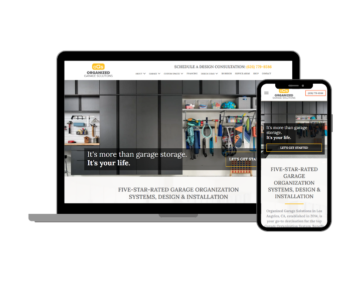 A laptop and a cell phone are sitting next to each other on a white background.