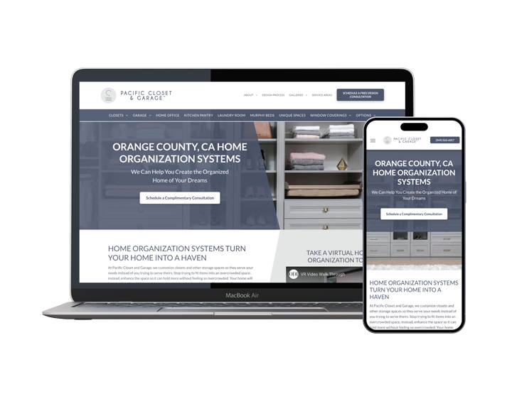 A laptop and a cell phone are sitting next to each other on a white background.