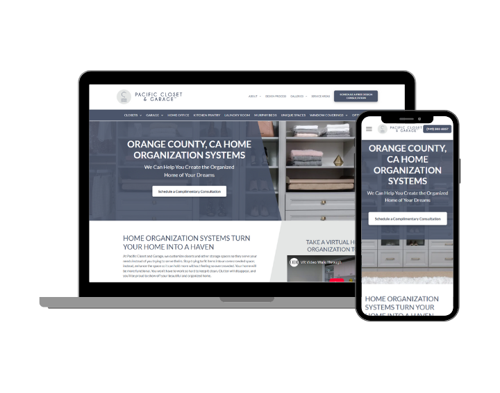 A laptop and a cell phone are sitting next to each other on a white background.