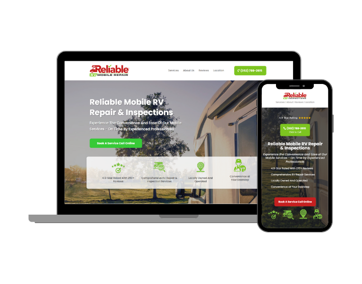 A laptop and a cell phone are sitting next to each other on a white background.