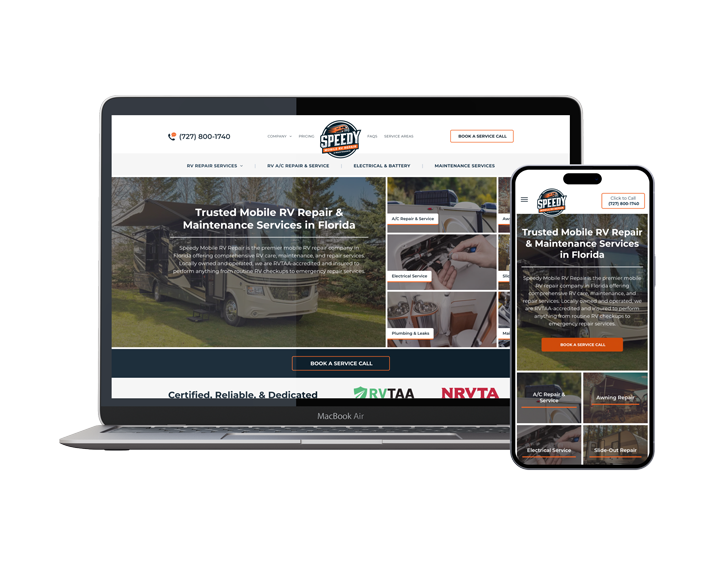 A laptop and a cell phone are sitting next to each other on a white background.