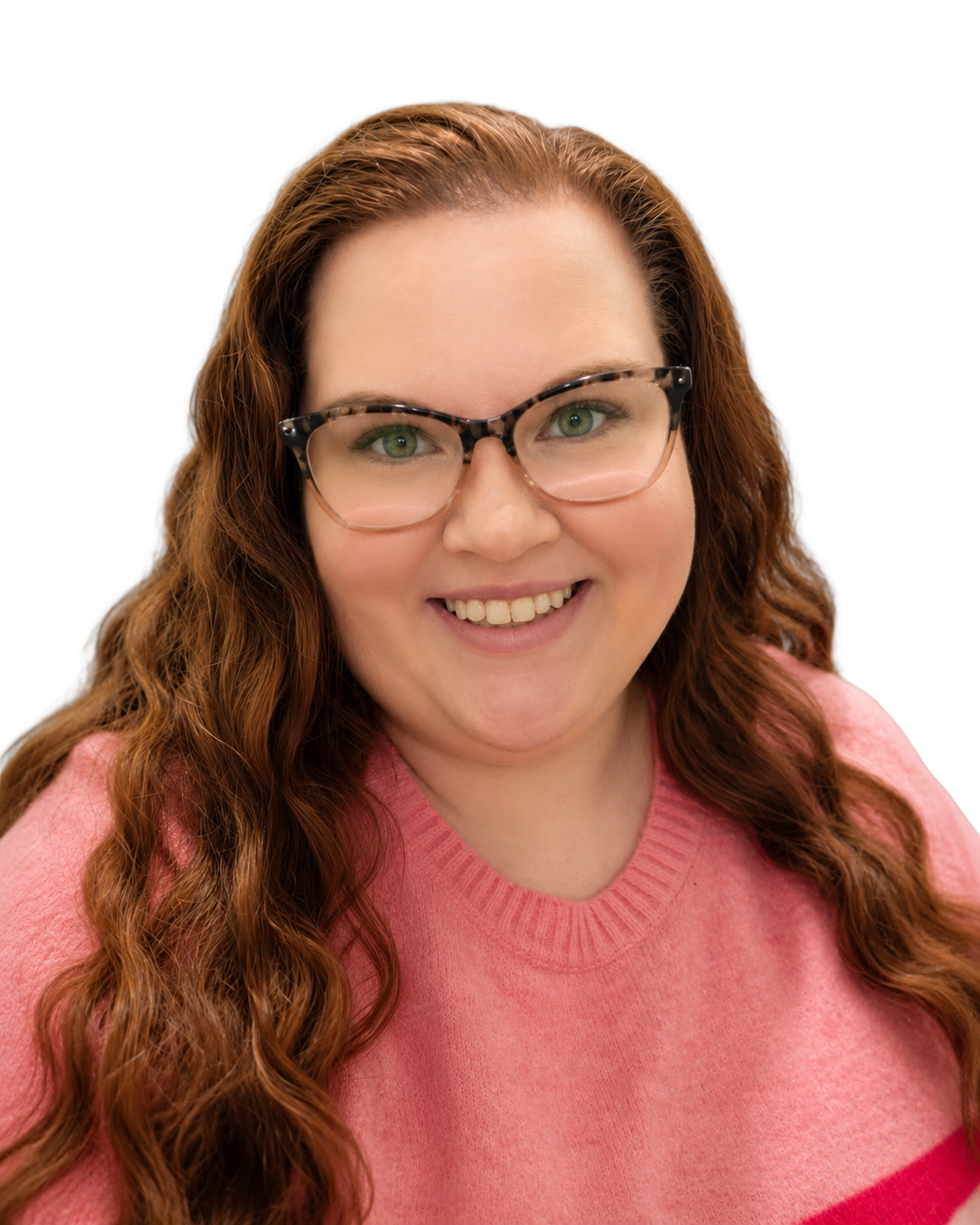 A woman wearing glasses and a green dress is smiling
