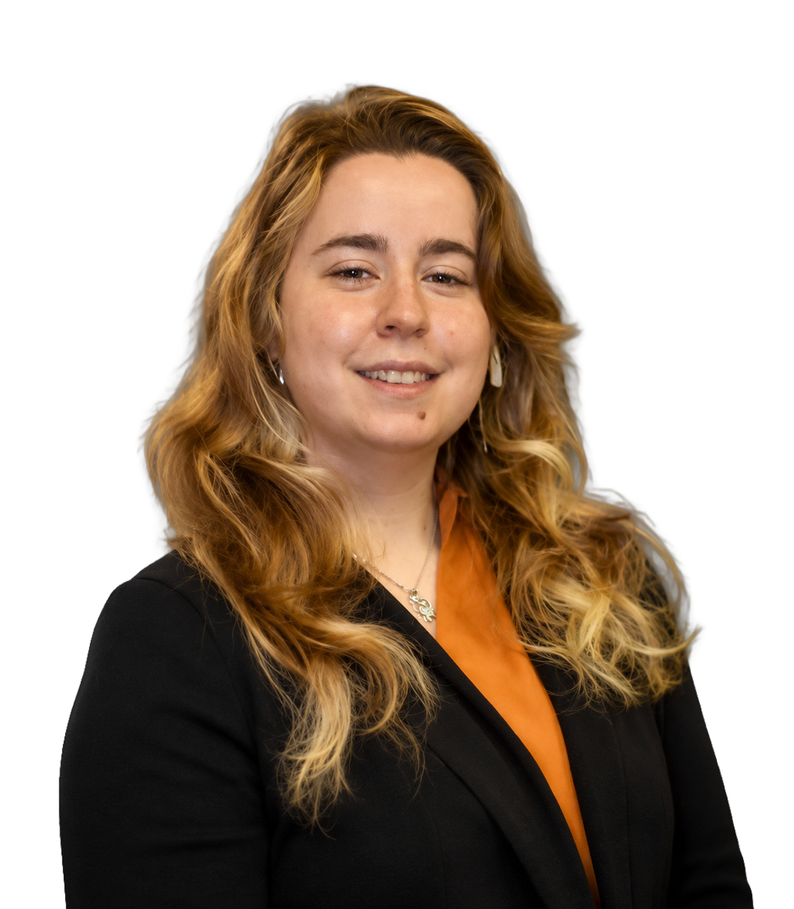 A woman with long hair is wearing a black jacket and an orange shirt