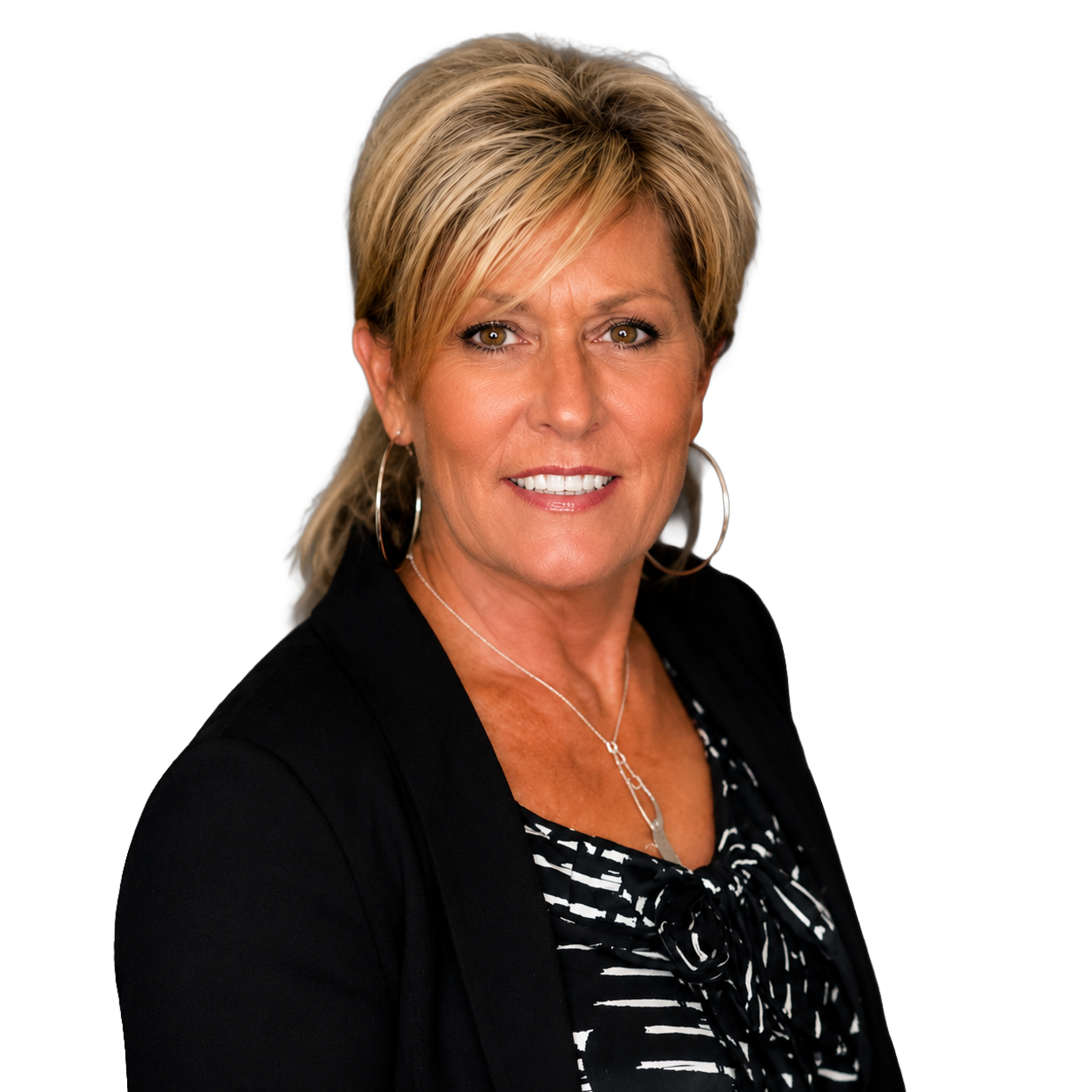 A woman wearing a black sweater and a black and white striped shirt