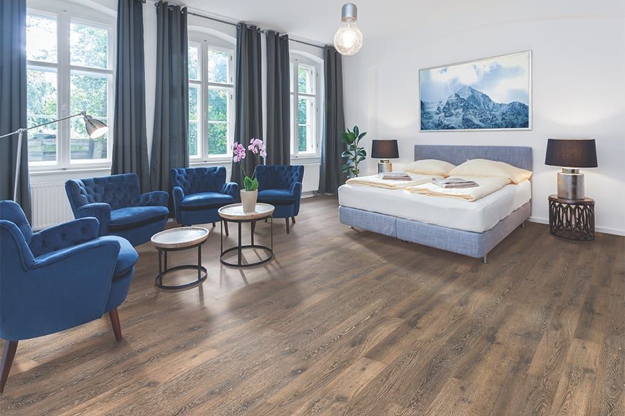 There is a large bed in the middle of the room.