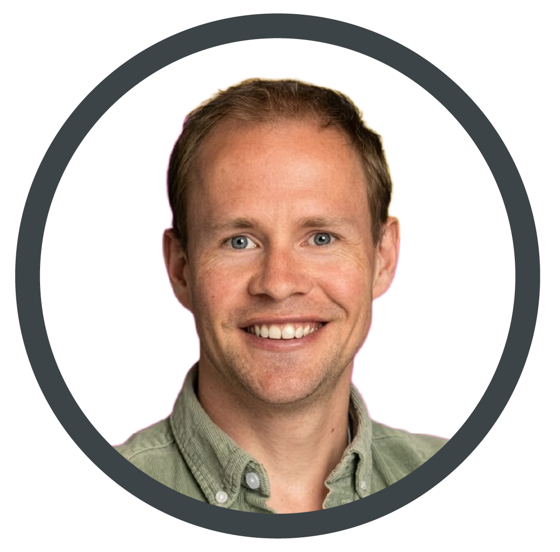 Headshot of a smiling person in a light green shirt inside a dark circular border