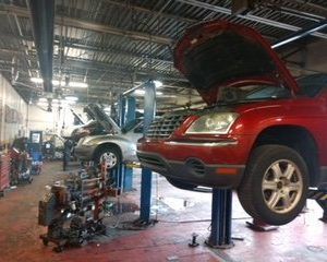 Several Vehicles on a Lifts in Clinton Township, MI