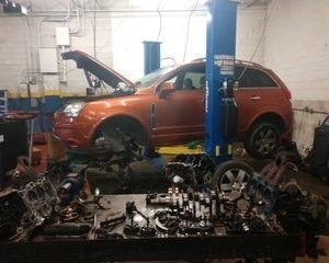 Vehicle on a Lift in Our Garage at Consumer Car Care