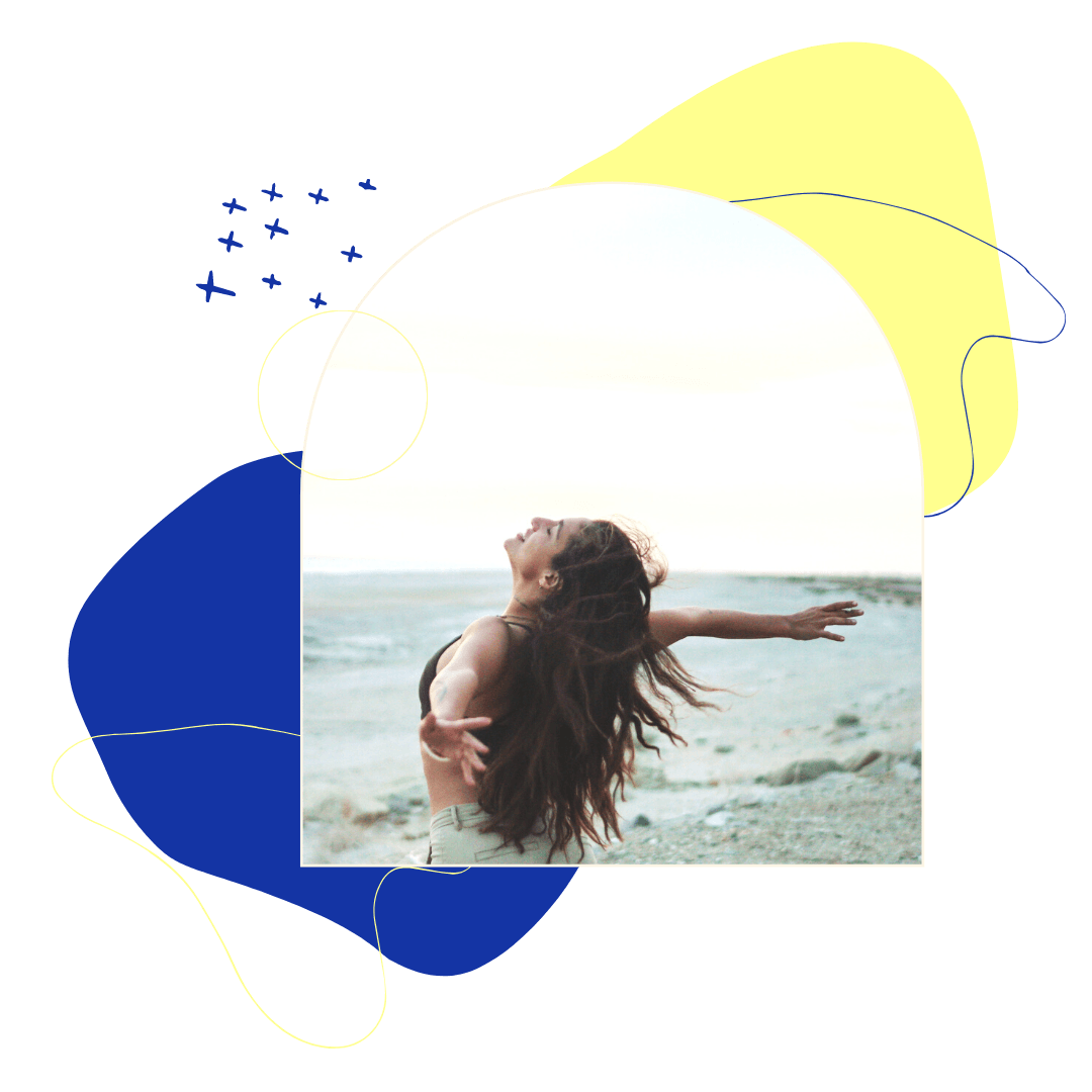 Woman with arms outstretched on a beach, hair flowing. Blue and yellow abstract shapes surround.