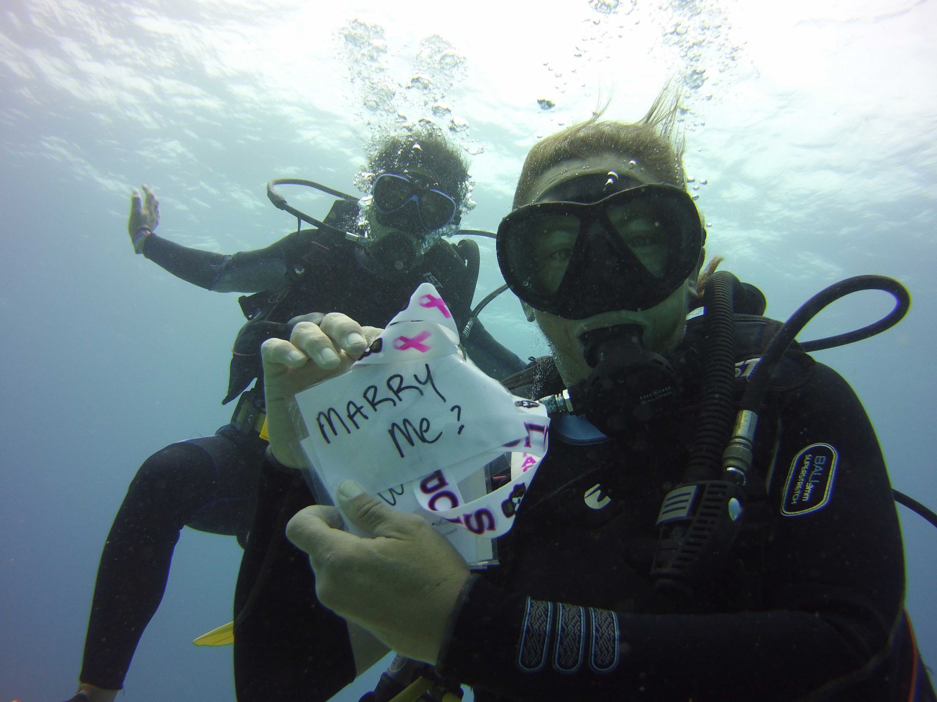 Scuba diver holding a 