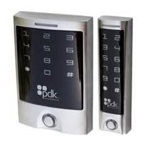 A couple of remote controls sitting next to each other on a white background.