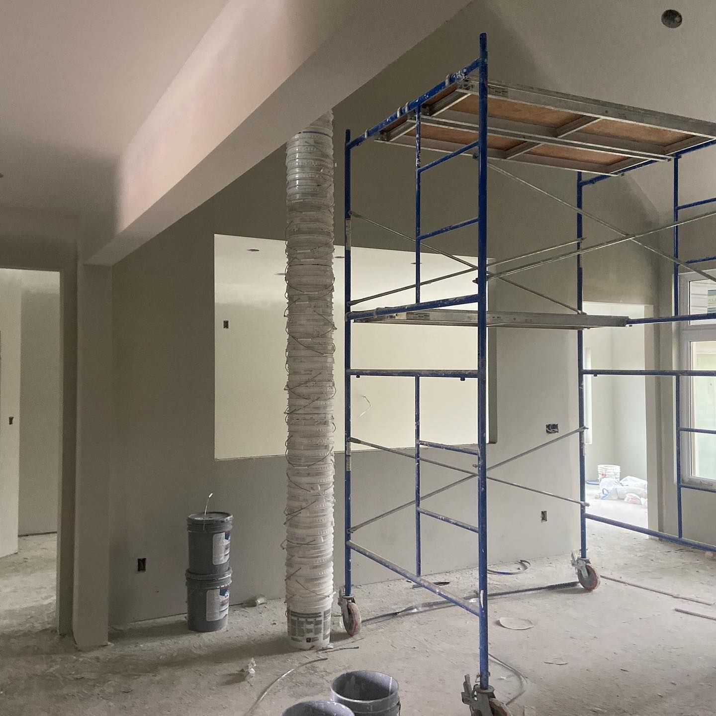 A room with a scaffolding in the middle of it