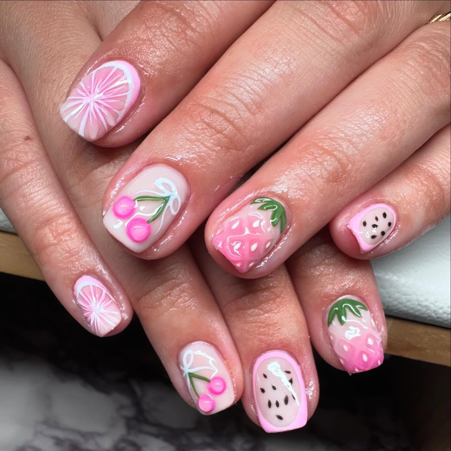 Adorable pink strawberry nails