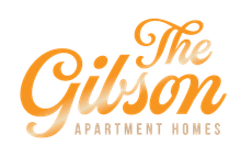 The Gilson Apartment Homes logo in orange script on a white background