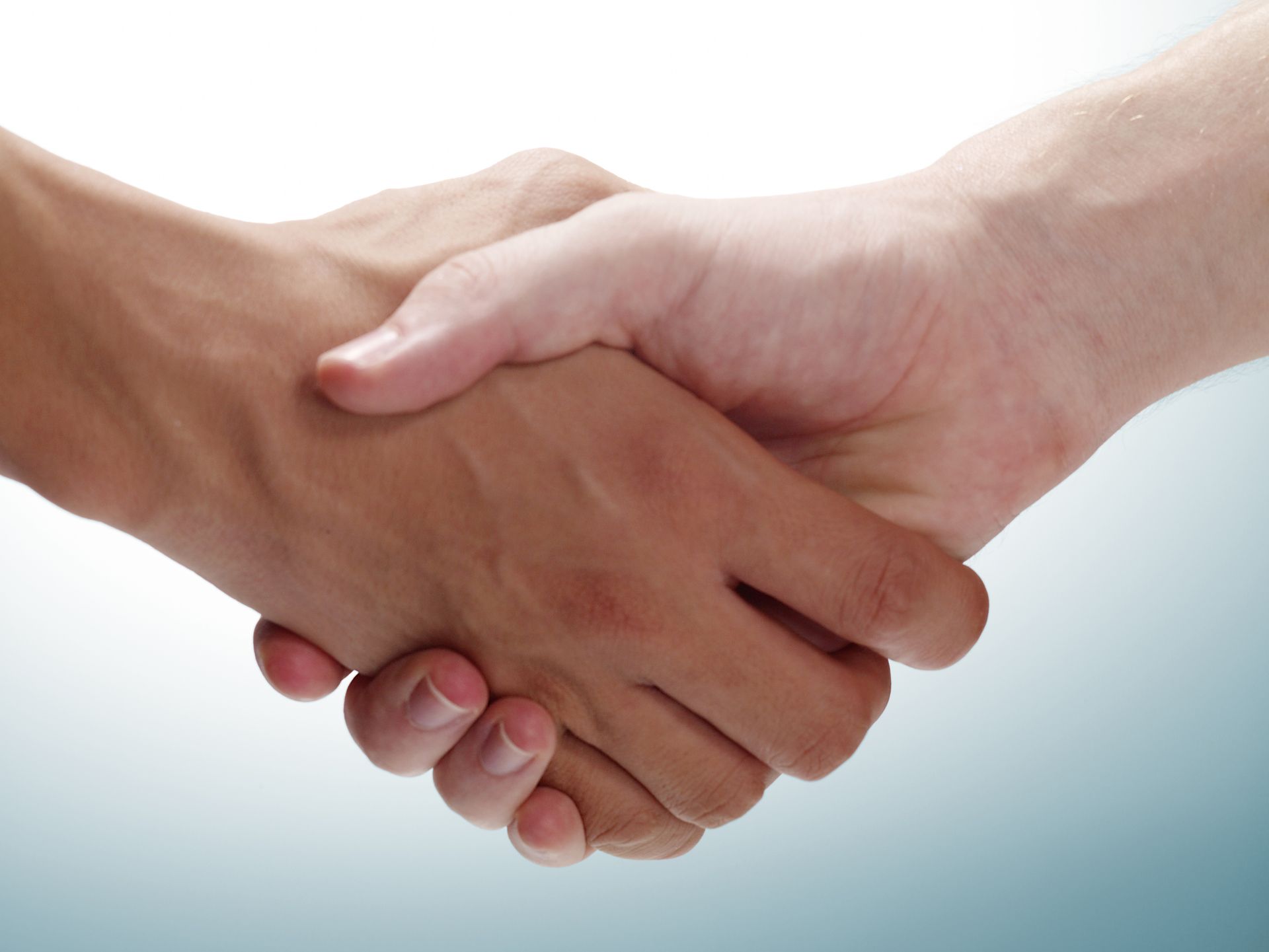 Shakehands — Billings, MT — Empire Roofing Inc