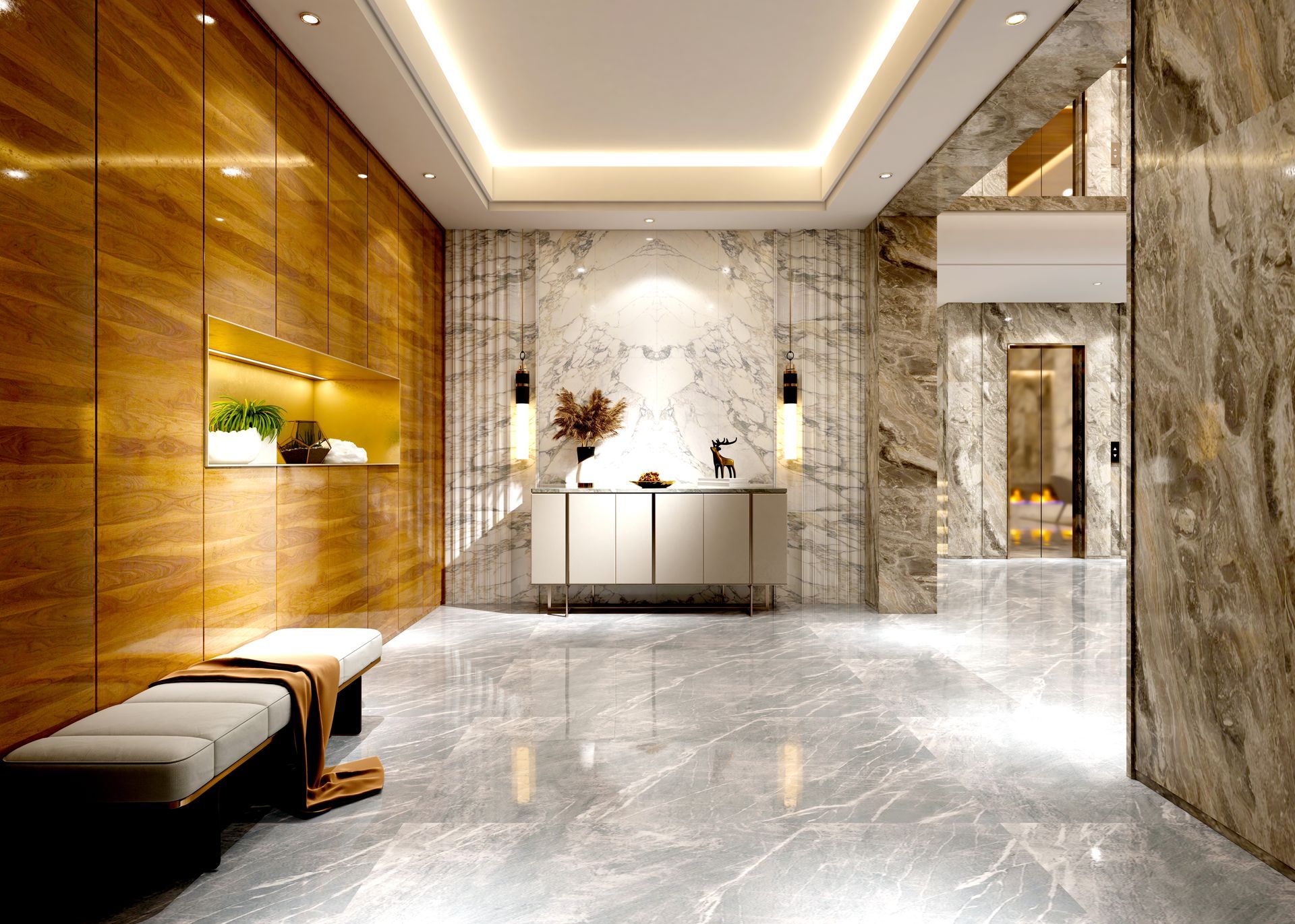 Modern marble lobby with gold wood panels, a bench, and a reception desk under warm ceiling lights