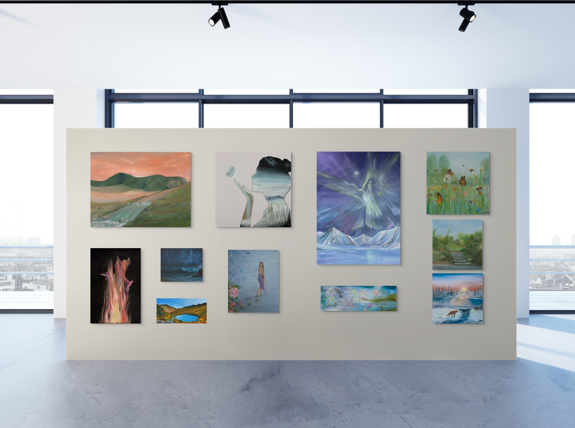Art gallery wall with nine colorful landscape paintings in a bright modern studio.