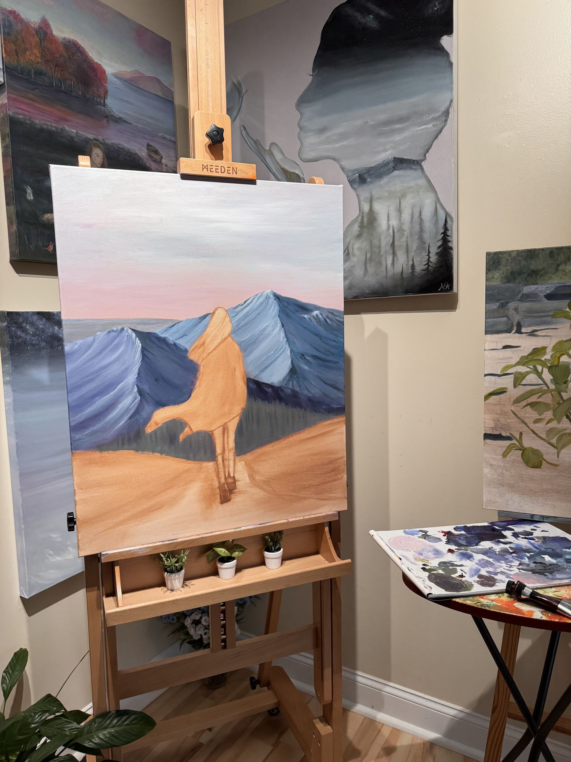 artist, Nicole Ann, painting the base layer on visionary artwork 'better that how i found it'