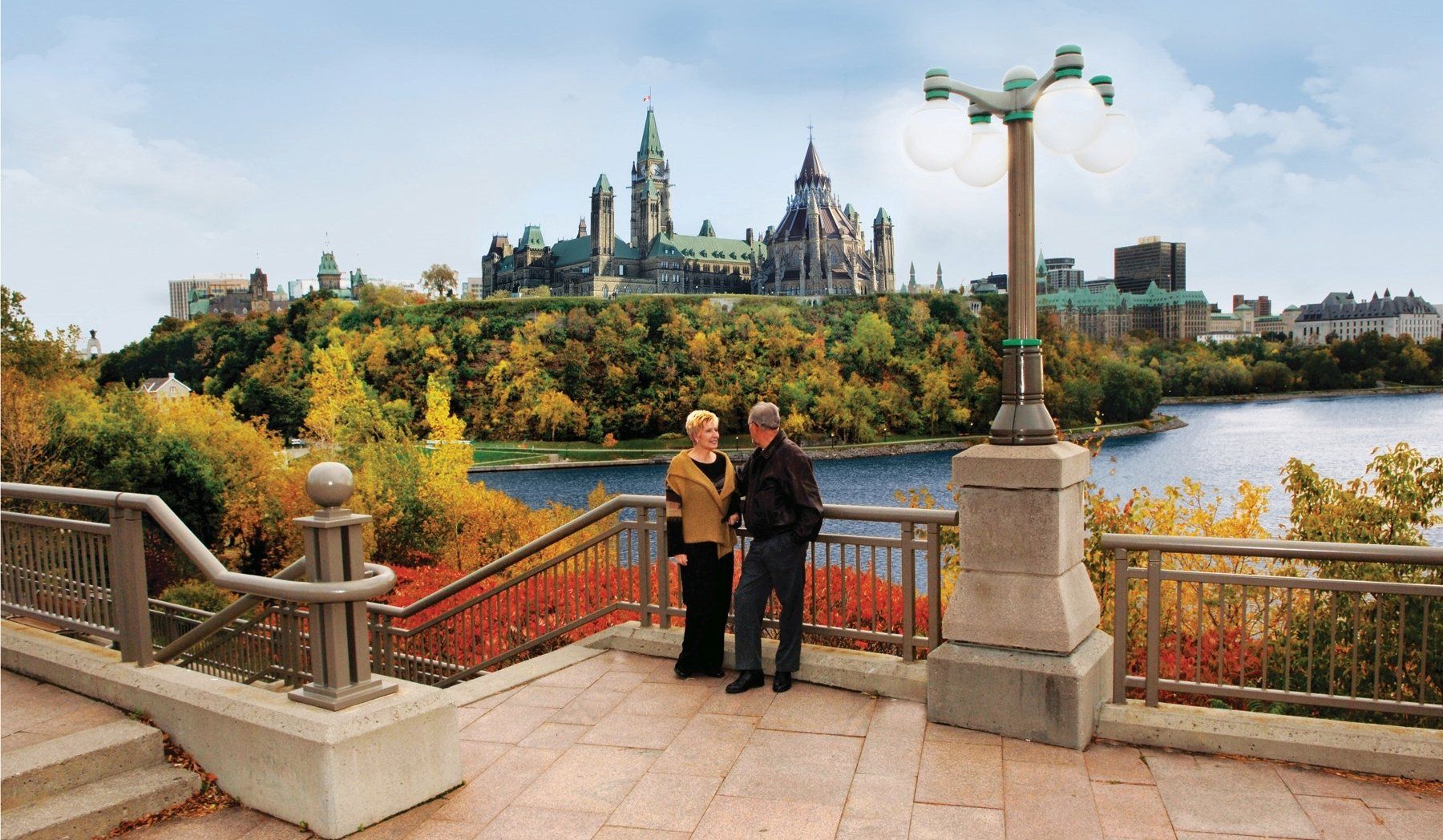 Couple on an Ottawa bridge in the fall
