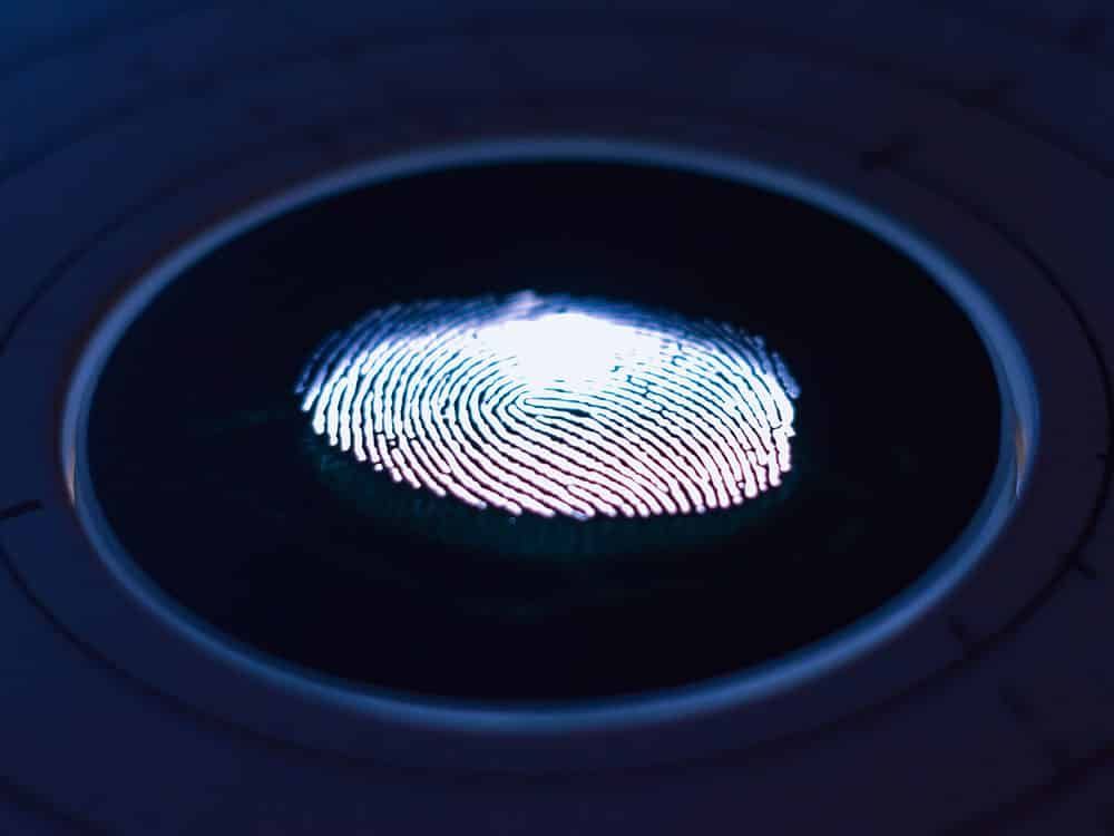 Close-up of a Glowing Fingerprint Illuminated on a Circular Scanner — IRIS CCTV in South Grafton, NSW