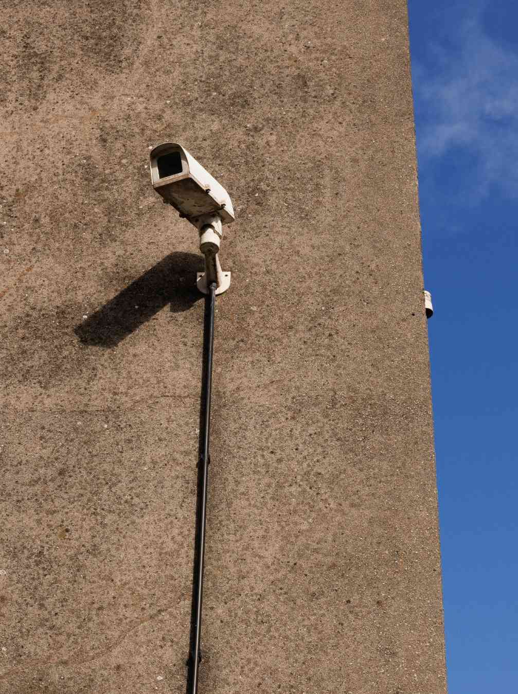 Security Camera Mounted on a Textured, Brown Wall — IRIS CCTV in South Grafton, NSW