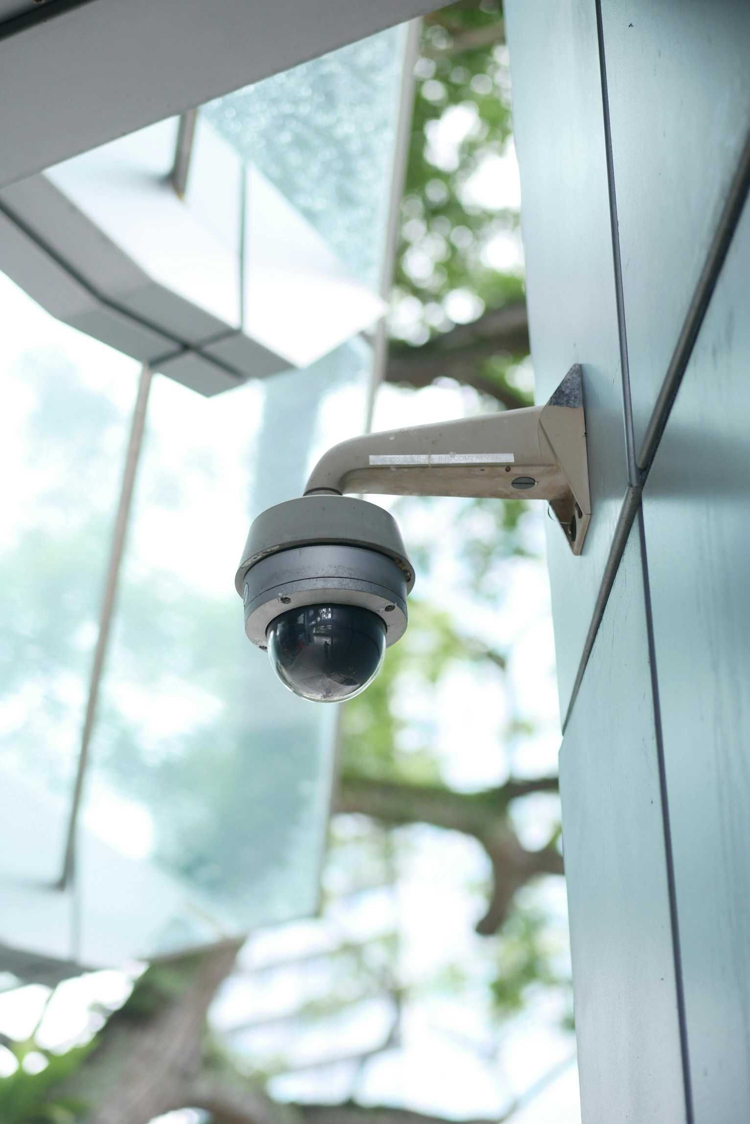 Security Camera Mounted on a Building Exterior, Aimed Downwards — IRIS CCTV in South Grafton, NSW