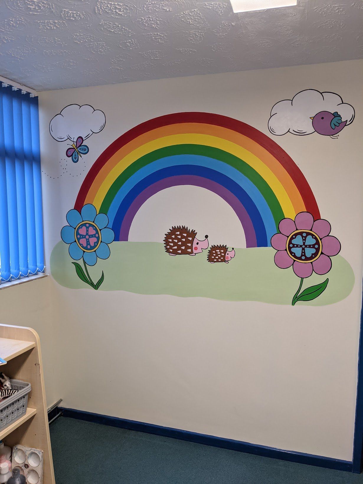 primary school rainbow 
mural sen room