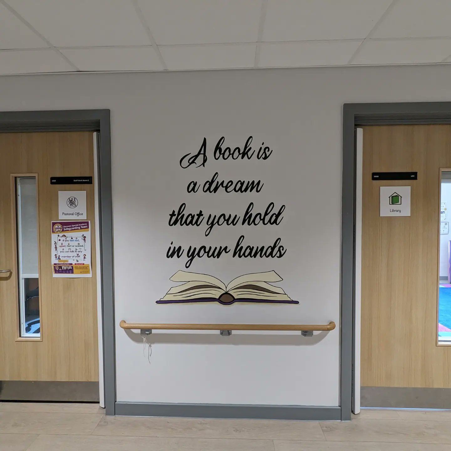 A book is a dream you hold in your hands discovery special academy middlesbrough reading education murals