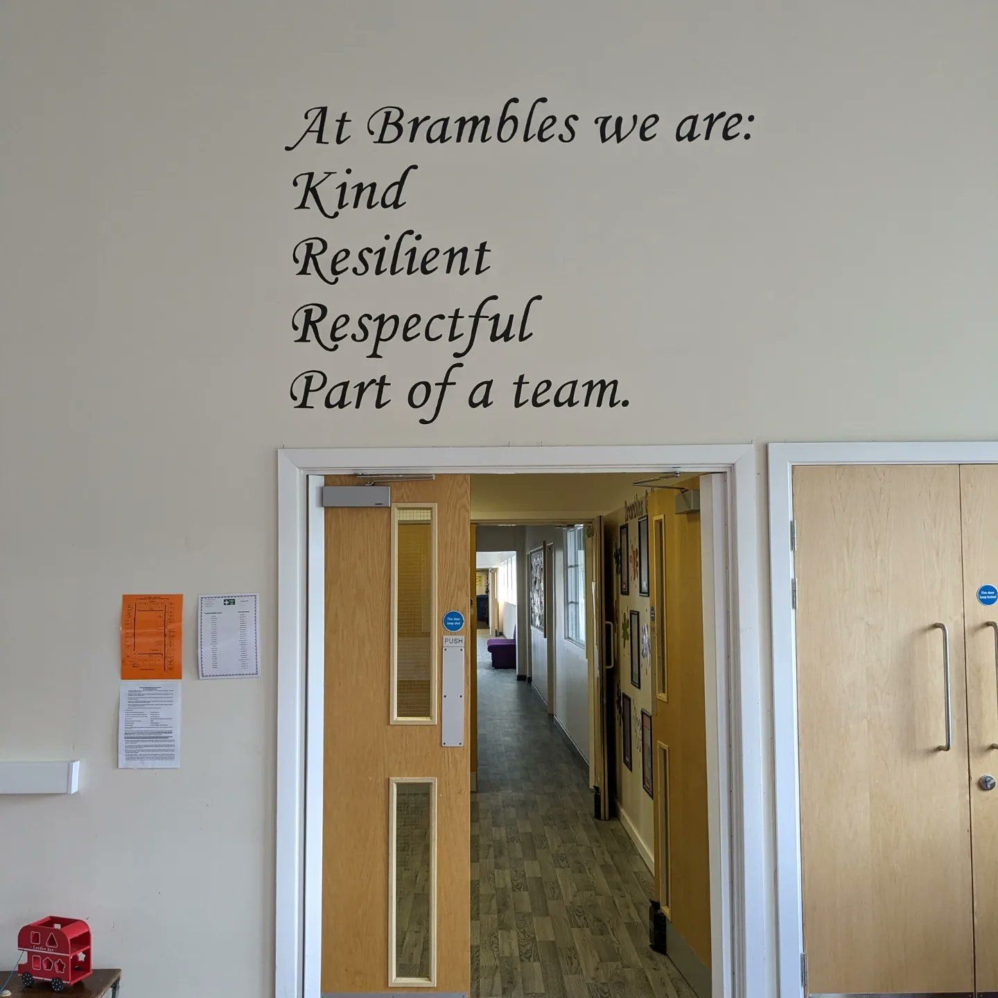 Brambles primary school values text mural in hall 