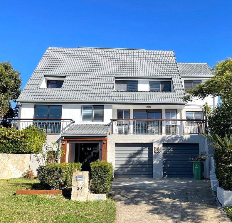 Modern roof repainted — Roof Painting in Southport QLD