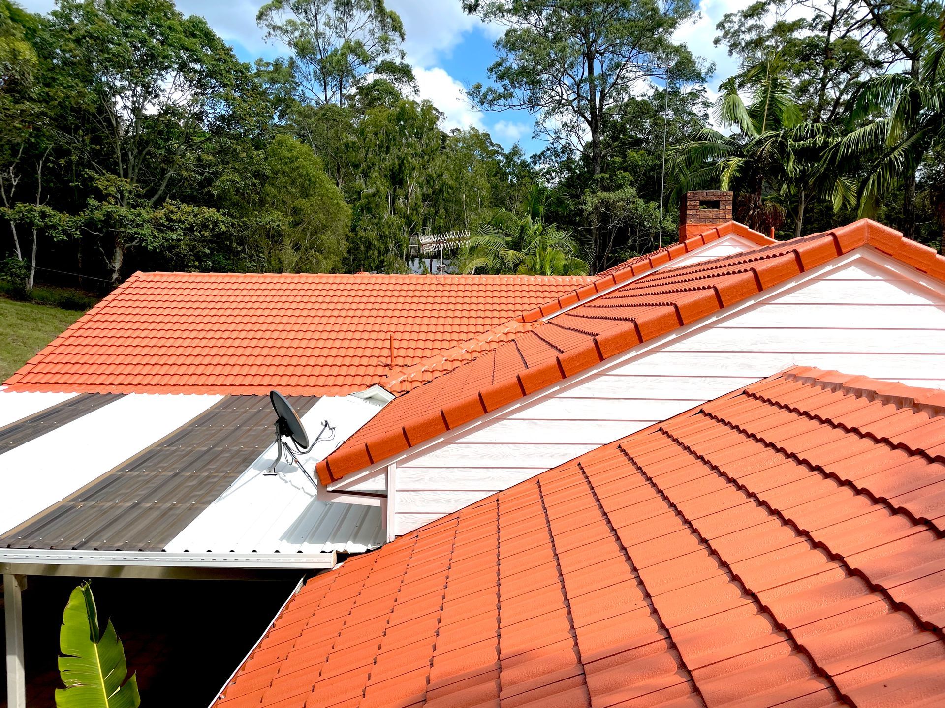 Newly done red roof — Roof Restoration in Southport QLD