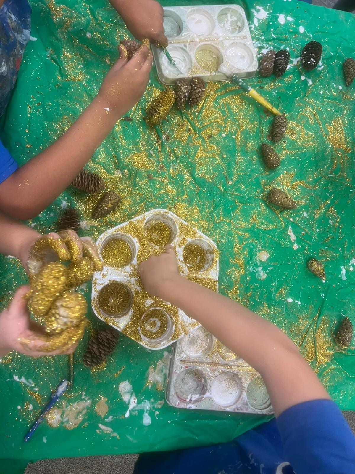 Children making Christmas decorations